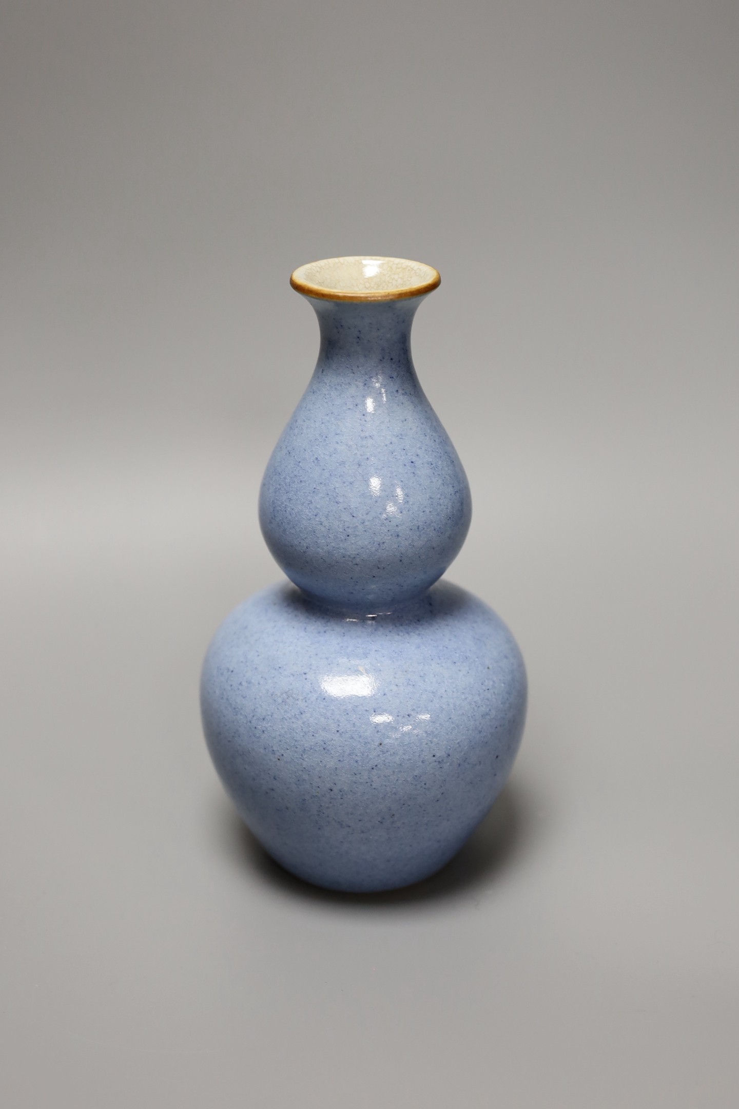 A Chinese powder blue double gourd vase, 20cm